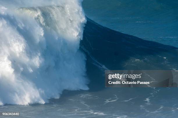 German big wave surfer Sebastian Steudtner, drops a wave during a surf session at Praia do Norte on January 18, 2018 in Nazare, Portugal.