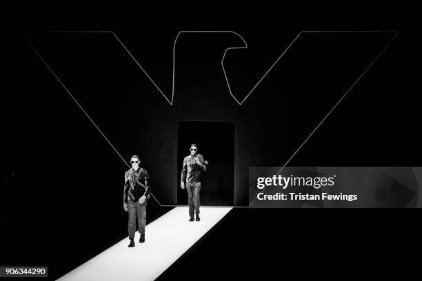 Models walk the runway at the Emporio Armani show during Milan Men's Fashion Week Fall/Winter 2018/19 on January 13, 2018 in Milan, Italy.