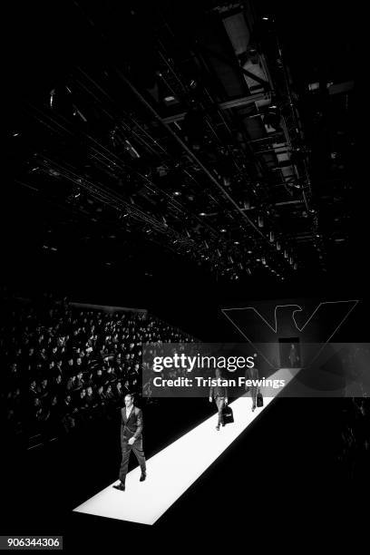 Models walk the runway at the Emporio Armani show during Milan Men's Fashion Week Fall/Winter 2018/19 on January 13, 2018 in Milan, Italy.