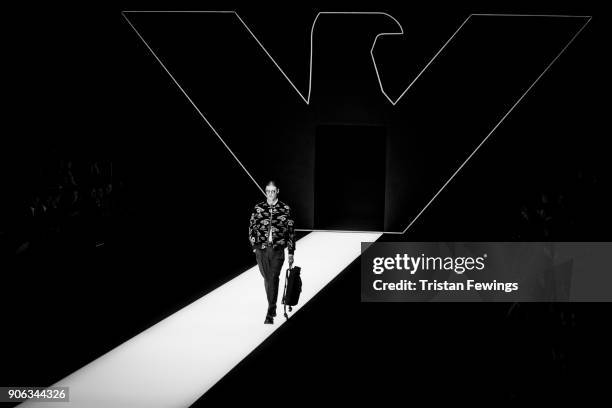 Model walks the runway at the Emporio Armani show during Milan Men's Fashion Week Fall/Winter 2018/19 on January 13, 2018 in Milan, Italy.
