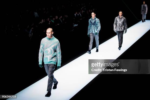 Models walk the runway at the Emporio Armani show during Milan Men's Fashion Week Fall/Winter 2018/19 on January 13, 2018 in Milan, Italy.