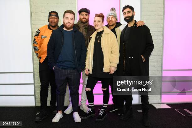 Radio DJ Tom Green stands with English singer Jess Glynne and DJ Locksmith , Piers Aggett , Kesi Dryden and Amir Amor of UK group Rudimental as they...