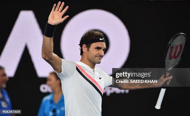 Switzerland's Roger Federer celebrates beating Germany's Jan-Lennard Struff in their men's singles second round match on day four of the Australian...