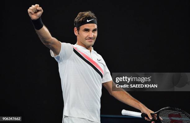 Switzerland's Roger Federer celebrates beating Germany's Jan-Lennard Struff in their men's singles second round match on day four of the Australian...