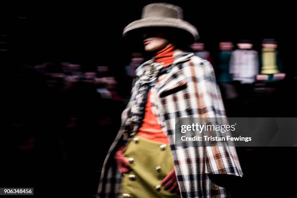 Model walks the runway at the Daks show during Milan Men's Fashion Week Fall/Winter 2018/19 on January 14, 2018 in Milan, Italy.