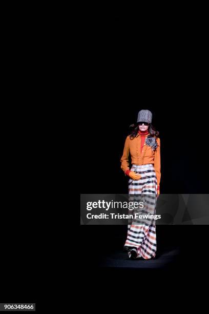 Model walks the runway at the Daks show during Milan Men's Fashion Week Fall/Winter 2018/19 on January 14, 2018 in Milan, Italy.