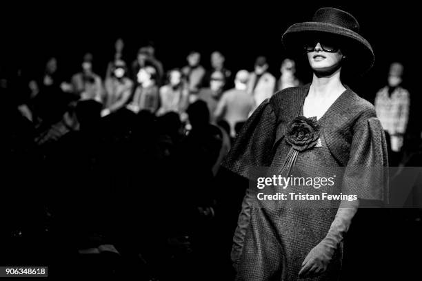 Model walks the runway at the Daks show during Milan Men's Fashion Week Fall/Winter 2018/19 on January 14, 2018 in Milan, Italy.