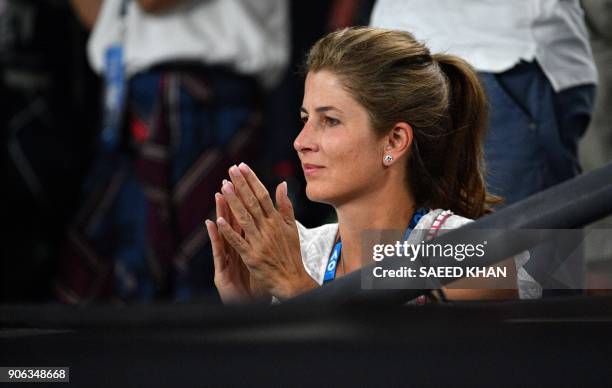 Mirka Federer, the wife of Switzerland's Roger Federer, reacts after her husband's win against Germany's Jan-Lennard Struff in their men's singles...
