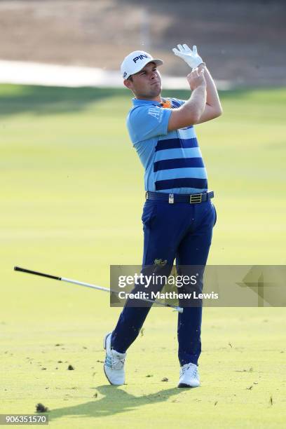 Tyrrell Hatton of England plays a shot on the 17th hole during round one of the Abu Dhabi HSBC Golf Championship at Abu Dhabi Golf Club on January...