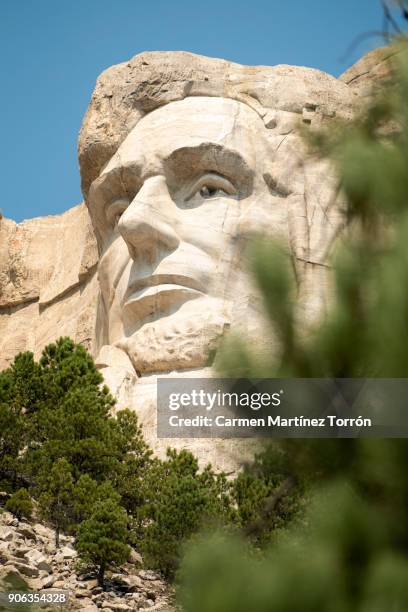 low angle view of mt rushmore national monument against clear sky - keystone stock pictures, royalty-free photos & images