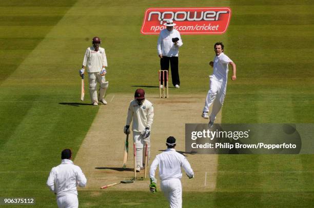 Graham Onions of England celebrates after bowling West Indies batsman Devon Smith during the 1st Test match between England and West Indies at Lord's...