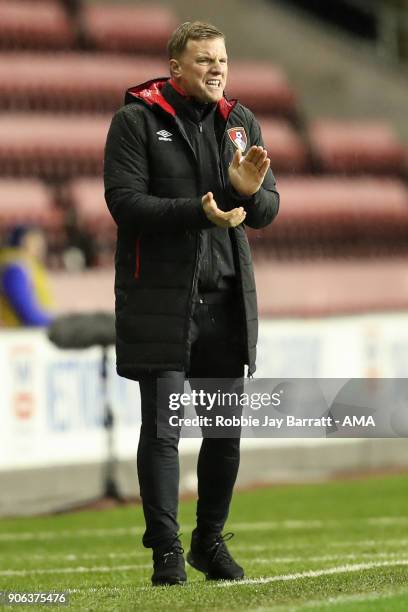 Eddie Howe head coach / manager of Bournemouth encourages during The Emirates FA Cup Third Round Replay between Wigan Athletic v AFC Bournemouth at...