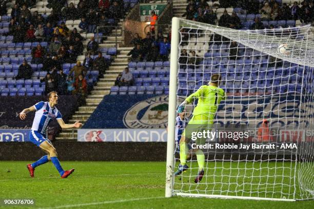 Dan Burn of Wigan Athletic scores a goal to make it 2-0 during The Emirates FA Cup Third Round Replay between Wigan Athletic v AFC Bournemouth at DW...