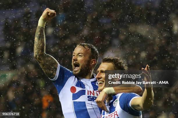 Dan Burn of Wigan Athletic celebrates after scoring a goal to make it 2-0 during The Emirates FA Cup Third Round Replay between Wigan Athletic v AFC...