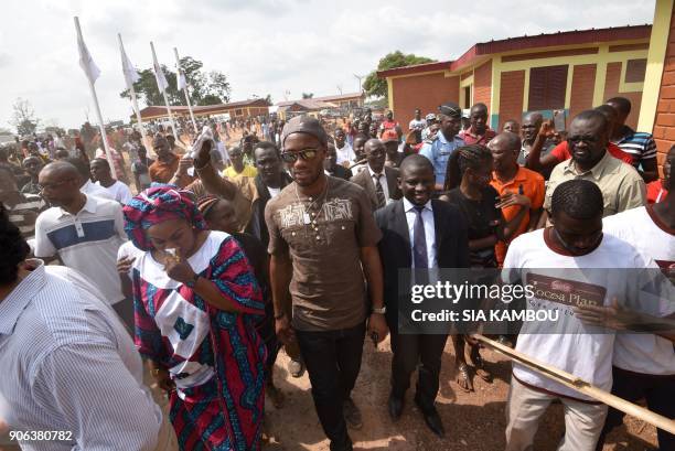 Ivory Coast's football star Didier Drogba arrives to the Primary School Didier Drogba during its inauguration on January 17, 2018 in Pokou-Kouamekro,...