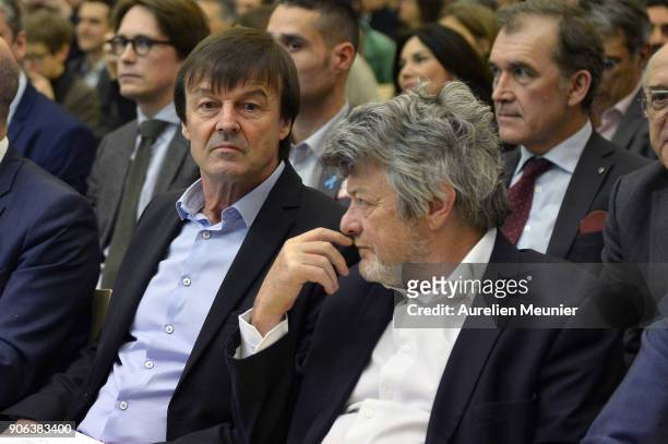 Former French Minister Jean Louis Borloo and French Ecology Minister Nicolas Hulot react during a press conference at Ministry of Ecology on January...