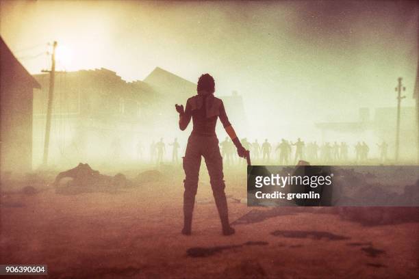 fantasy character against zombie hordes - character stock pictures, royalty-free photos & images