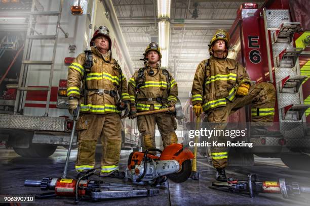 fire fighters team - firefighter foto e immagini stock