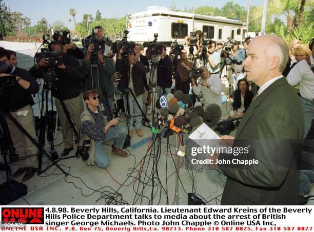 Beverly Hills, California. Lieutenant Edward Kreins of the Beverly Hills Police Department talks to media about the arrest of British singer George...