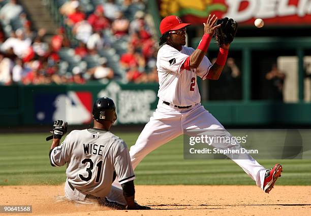 Shortstop Erick Ayber of the Los Angeles Angels of Anaheim takes the throw at second to force out Dewayne Wise of the Chicago White Sox and start a...