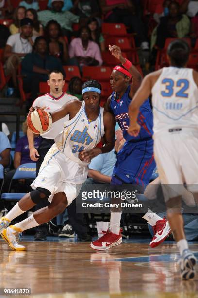 Sylvia Fowles of the Chicago Sky drives towards Cheryl Ford of the Detroit Shock during the WNBA game on September 12, 2009 at the UIC Pavilion in...