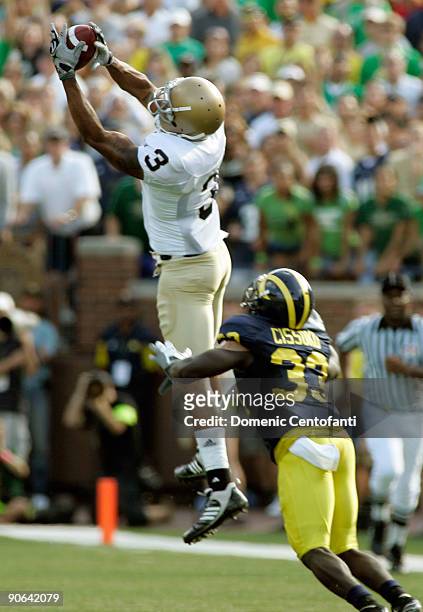 Wide receiver Michael Floyd of Notre Dame catches a pass early in the second half against Michigan at Michigan Stadium on September 12, 2009 in Ann...