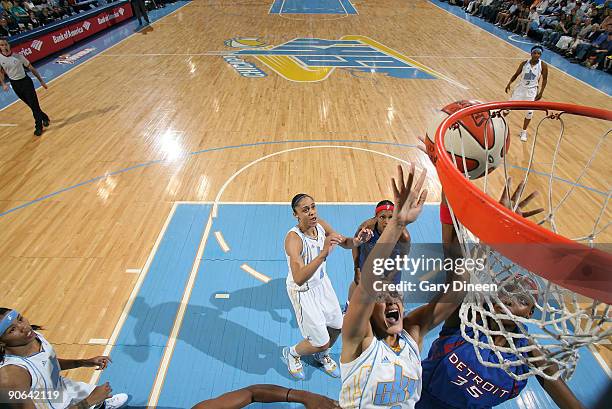 Erin Thorn of the Chicago Sky shoots the ball over Cheryl Ford of the Detroit Shock during the WNBA game on September 12, 2009 at the UIC Pavilion in...