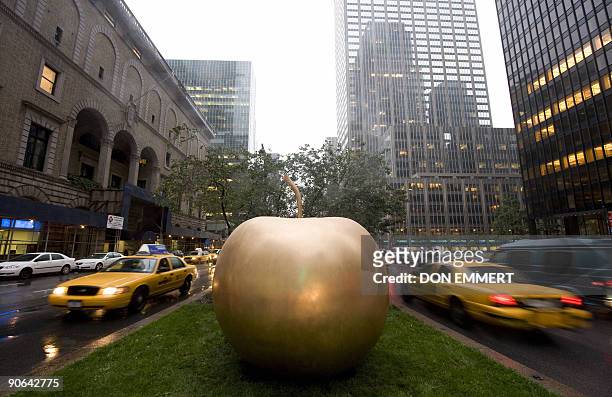 Pomme de New York by Claude Lalanne , a large-scale bronze sculpture of an apple, sits on Park Ave September 12, 2009 in New York. The New York City...