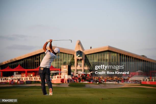 Hideto Tanihara of Japan plays his second shot on the ninth hole during round one of the Abu Dhabi HSBC Golf Championship at Abu Dhabi Golf Club on...