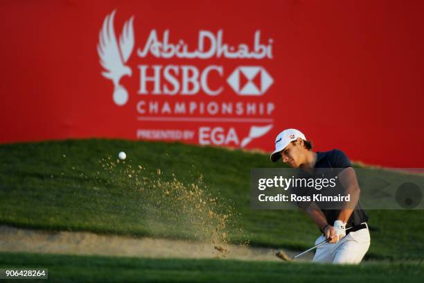 Joakim Lagergren of Sweden plays his third shot from a bunker on the ninth hole during round one of the Abu Dhabi HSBC Golf Championship at Abu Dhabi...