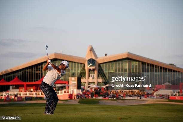 Hideto Tanihara of Japan plays his second shot on the ninth hole during round one of the Abu Dhabi HSBC Golf Championship at Abu Dhabi Golf Club on...