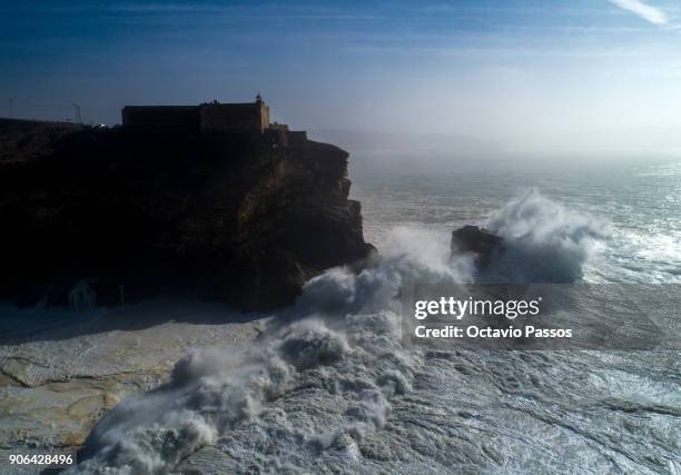 General view of Nazare lighthouse during a surf session at Praia do Norte on January 18, 2018 in Nazare, Portugal.