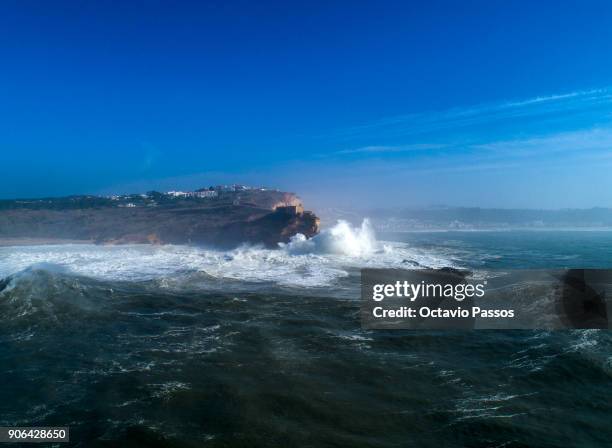 General view of Nazare lighthouse during a surf session at Praia do Norte on January 18, 2018 in Nazare, Portugal.