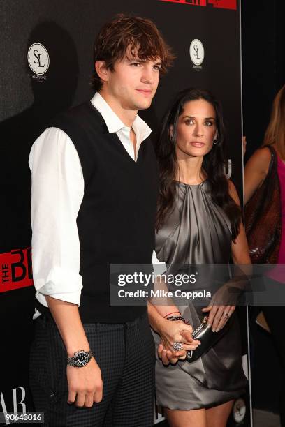 Actors Ashton Kutcher and Demi Moore attend The CW's "The Beautiful Life: TBL" series premiere at Simyone Lounge on September 12, 2009 in New York...