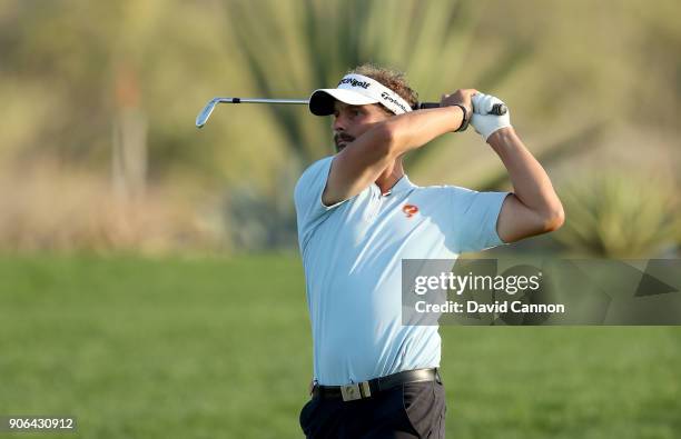 Joost Luiten of The Netherlands plays his second shot on the par 4, 17th hole during the first round of the 2018 Abu Dhabi HSBC Golf Championship at...