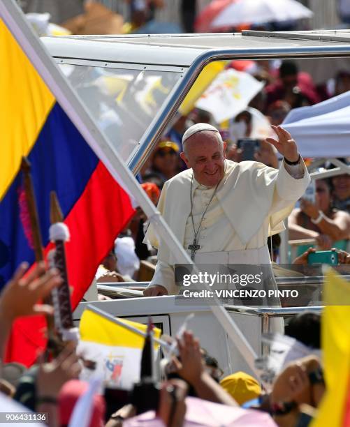 Pope Francis arrives on the popemobile at the site at Lobitos Beach, near the northern Chilean city of Iquique, where he will celebrate an open-air...