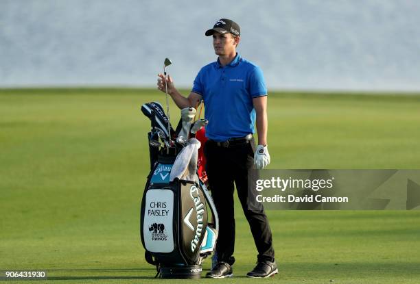 Chris Paisley of England waits to play his second shot on the par 4, 17th hole during the first round of the 2018 Abu Dhabi HSBC Golf Championship at...
