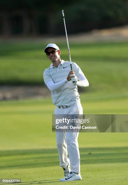 Dylan Frittelli of South Africa plays his second shot on the par 4, 17th hole during the first round of the 2018 Abu Dhabi HSBC Golf Championship at...