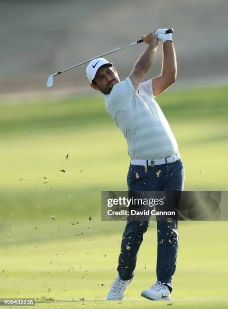 Alexander Levy of France plays his second shot on the par 4, 17th hole during the first round of the 2018 Abu Dhabi HSBC Golf Championship at the Abu...