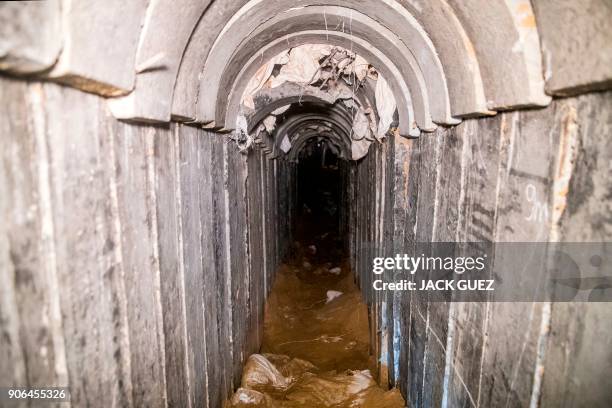 Picture taken on January 18, 2018 from the Israeli side of the border with the Gaza Strip shows a tunnel, that Israel says was dug by the Islamic...