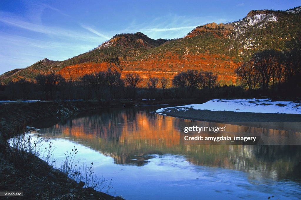 Landscape sunset river mountain reflection