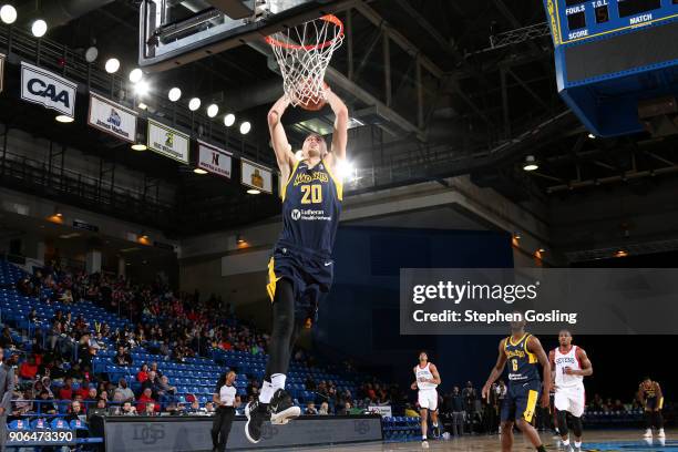 Jarrod Uthoff of the Fort Wayne Mad Ants drives to the basket against the Delaware 87ers during a G-League at the Bob Carpenter Center in Newark,...