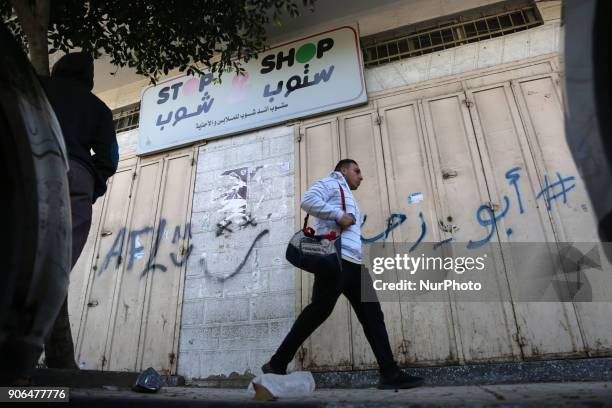 In the picture, a market has been closed because the economic conditions.Gazans are strapped for cash and markets are suffering from an unprecedented...