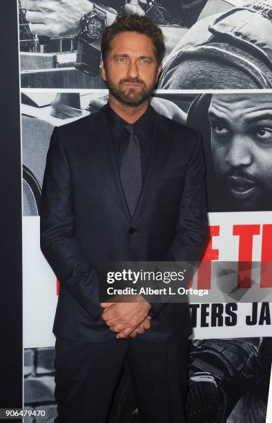 Actor Gerard Butler arrives for the Premiere Of STX Films' "Den Of Thieves" held at Regal LA Live Stadium 14 on January 17, 2018 in Los Angeles,...