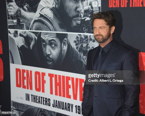 Actor Gerard Butler arrives for the Premiere Of STX Films' "Den Of Thieves" held at Regal LA Live Stadium 14 on January 17, 2018 in Los Angeles,...