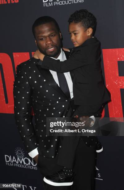 Actor/rapper Curtis Jackson aka 50 Cent and son Sire Jackson arrive for the Premiere Of STX Films' "Den Of Thieves" held at Regal LA Live Stadium 14...