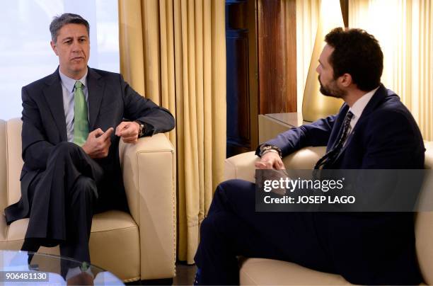 Newly elected Catalan parliament speaker Roger Torrent and Catalan Popular Party leader, Xavier Garcia Albiol hold a meeting at the Catalan regional...