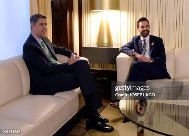 Newly elected Catalan parliament speaker Roger Torrent and Catalan Popular Party leader, Xavier Garcia Albiol hold a meeting at the Catalan regional...