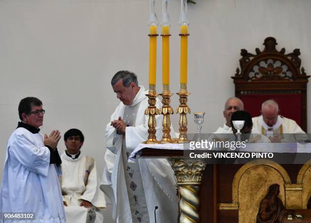 The bishop of Osorno, Juan Barros , takes part in an open-air mass celebrated by Pope Francis at Lobitos Beach, near the Chilean northern city of...