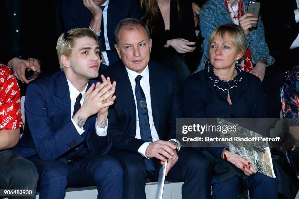 Xavier Dolan, CEO of Louis Vuitton Michael Burke and his wife Brigitte Burke attend the Louis Vuitton Menswear Fall/Winter 2018-2019 show as part of...